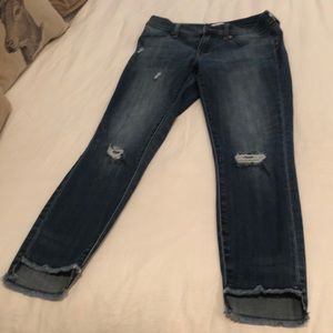 Distressed women’s jeans